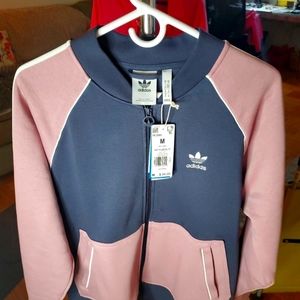 Adidas unisex  sweat suit top medium, bottom large.